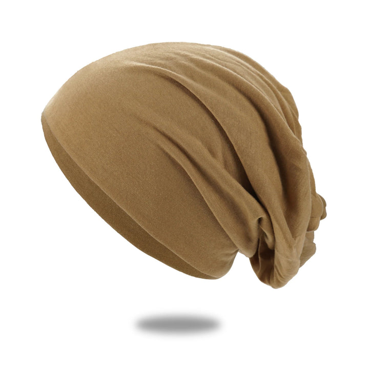 Slouch beanie i andningsbar stickning med stretch