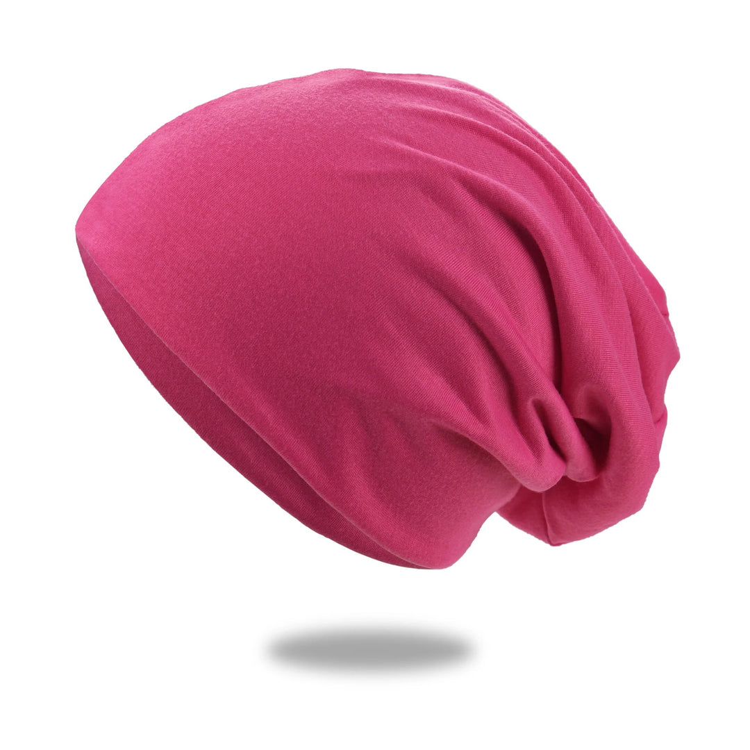 Slouch beanie i andningsbar stickning med stretch
