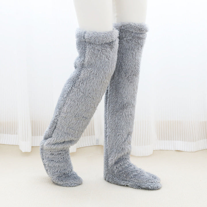 Mjuka knävärmare i fluffig mikrofiber med öppen tå